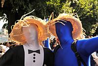 Two men together, hidden identity, Morphsuits spandex body-tight costumes covering bodies and faces, Lake Parade - LGBT Parade, Pride Parade, Geneva -...