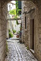 Streetview with old typical houses in Trogir, Split-Dalmatia, Croatia, Europe.