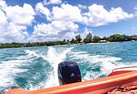 Speed boat trip to Île Aux Cerfs, or Deer Island, Mauritius, Mascarene Islands.