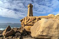 Rock formations of the Côte de granite rose or Pink Granite Coast and the lighthouse Phare de Ploumanac’h near Ploumanac'h, Perros-Guirec, Brittany, F...