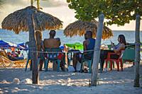 DOMINICUS, DOMINICAN REPUBLIC: People on Dominicus Beach at sunset.