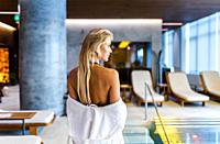 Beautiful woman relaxing in a beauty spa hotel - Client having a beauty treatment in a beauty spa salon.