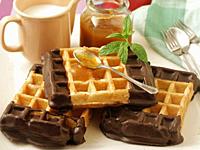 Waffles with chocolate and jam.