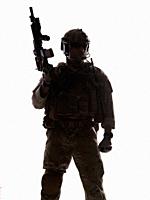 Silhouette of special warfare operator with assault rifle.