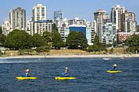 People on pedal boats, False Creek, Vancouver, British Columbia, Canada.