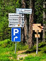 Traditional Street Direction Signs in Val d Ega, Eggen valley, summer 2021, South Tyrol, Italy, Europe.