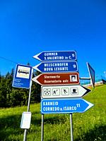 Traditional Street Direction Signs in Val d Ega, Eggen valley, summer 2021, South Tyrol, Italy, Europe.