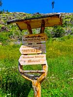 Traditional Direction Signs in Val d Ega, Eggen valley, summer 2021, South Tyrol, Italy, Europe.