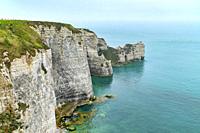 The tall cliffs of Étretat in Normandy, France.