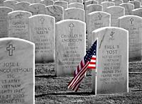 American Flag on gravestone in the Sarasota National Cemetery in Sarasota Florida USA.