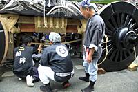 Japan, Kyoto, Gion Matsuri, festival preparations, workmen,.