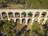 Aerial view of Ancient roman bridge aqueduct Pont del Diable or Devil's Bridge in Tarragona, Spain. . . The so-called aqueduct de les Ferreres, also k...