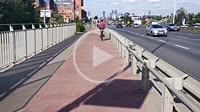 Bicycle riding on a bike lane in Warsaw city, Poland