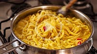 Stir the pasta cooking detail
