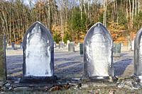 Old headstones at Woodstock Cemetery in Woodstock, New Hampshire during the autumn months. This cemetery is located along the Daniel Webster Highway.