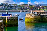 Boat leaving the Port to La Concha Bay, Donostia, San Sebastian, cosmopolitan city of 187,000 inhabitants, noted for its gastronomy, urban beaches and...
