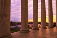 Sunset through columns at the Thomas Jefferson Memorial, Washington, DC USA.
