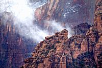 Rain clouds and fog have enveloped Zion Canyon at Zion Canyon National Park, Utah.
