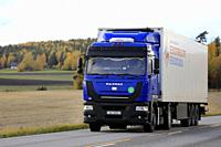 MAZ-MAN truck, BY, hauls goods on road in Salo, Finland. October 11, 2019. MAZ-MAN vehicles are a joint venture between Belarusian MAZ and German MAN.