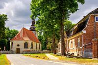 Nehringen, community of Grammendorf, Mecklenburg-Western Pomerania, Germany: The Church St. Andreas, along with the historic farm building of the Nehr...