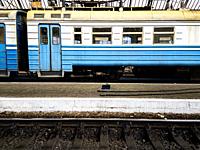 Lviv, Ukraine. Old, Soviet Style train wagon waiting at a Lviv Main Railway Station's Platform after disembarking passengers.