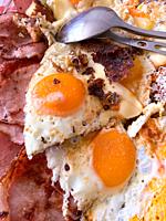 bacon and eggs with cutlery