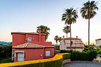 Luxury Mediterranean Villas in resort at sunset. Valencia, Spain.