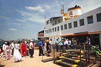 Visitors taking the traditional ferry from the port in Kinaliada island, Princes' Islands, Istanbul, Marmara Region, Turkey, Europe.