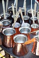 Turkish coffee pots made of metal in a traditional style.