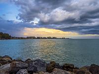 Stormy skies over the Gulf of Mexico and the Venice Florida USA coastline.