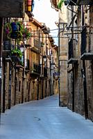 Cobblestoned street in the medieval town of Laguardia, Alaba, Spain. Picturesque And Narrow Streets On A Sunny Day. Architecture, Art, History, Travel...