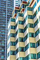 Orange Yellow High Rise Apartment Buildings Balconies Downtown Miami Florida.