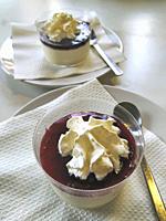 Pannacotta with cream and jam.