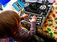 Today´s child tries his hands at technology from generations ago, Ontario, Canada. State-of-the Arts for grandpa, hopelessly obsolete today in the Wes...
