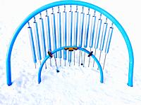 A giant musical instrument in snow in a public park, Ontario, Canada. A children’s play area. Open year round. Outdoors. All seasons. No hibernation.