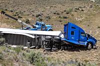 Diamondville, Wyoming - A semi-trailer truck that drove off U. S. Highway 30 and crashed in southwestern Wyoming.