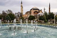 Fountain in Sultanahmet Park with Hagia Sophia in the background. Istanbul, Türkiye (Republic of Türkiye).