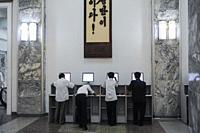 Pyongyang, North Korea, Asia - Men in front of computers use the intranet at the Grand People's Study House, the central library located in the North ...