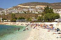 Scene from the pebbled beach of Kalkan, Antalya Province, Mediterranean Coast, Ancient Lycia Region, Turkish Riviera, Turkey, Europe.