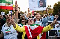 Berlin, Germany, Europe - Iranian women protest together with several hundred activists during a demonstration and solidarity rally in Mitte district ...