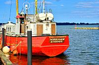 The cutter Nordland III, a former war fishing cutter demilitarized after World War II, at its berth in the town harbor of Greifswald Wieck, Hanseatic ...