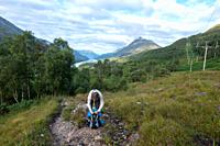 hiker in the highland mountains in the area of Kinlochleven in Scotland