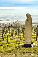 statue of Saint Agnes with vineyards near Palvov, Southern Moravia, Czech Republic.