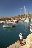 Tourists on a daily excursion boat leaving the harbor for a trip, Kalkan village, Antalya Province, Mediterranean Coast, Ancient Lycia Region, Turkish...