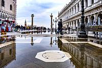 Visible effect of climate change on Venice; flooded Piazza San Marco in Venice, Italy, Europe.