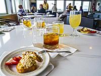 Complimentary appetizers and cocktails aboard a small cruise ship.