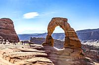 Delicate Arch Tourists Rock Canyon Arches National Park Moab Utah USA Southwest.