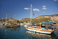 Tourists on a daily excursion boat leaving the harbor for a trip in Kalkan village, Antalya Province, Mediterranean Coast, Ancient Lycia Region, Turki...