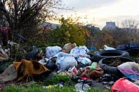 Belgrade, Serbia - November 17, 2022: Garbage and trash at Landfill scatered all over the place in Belgrade, Serbia.