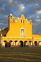 Visitors in front of the Monastery-Convent Of San Antonio De Padua, Izamal, Yucatan Province, Mexico, North America.